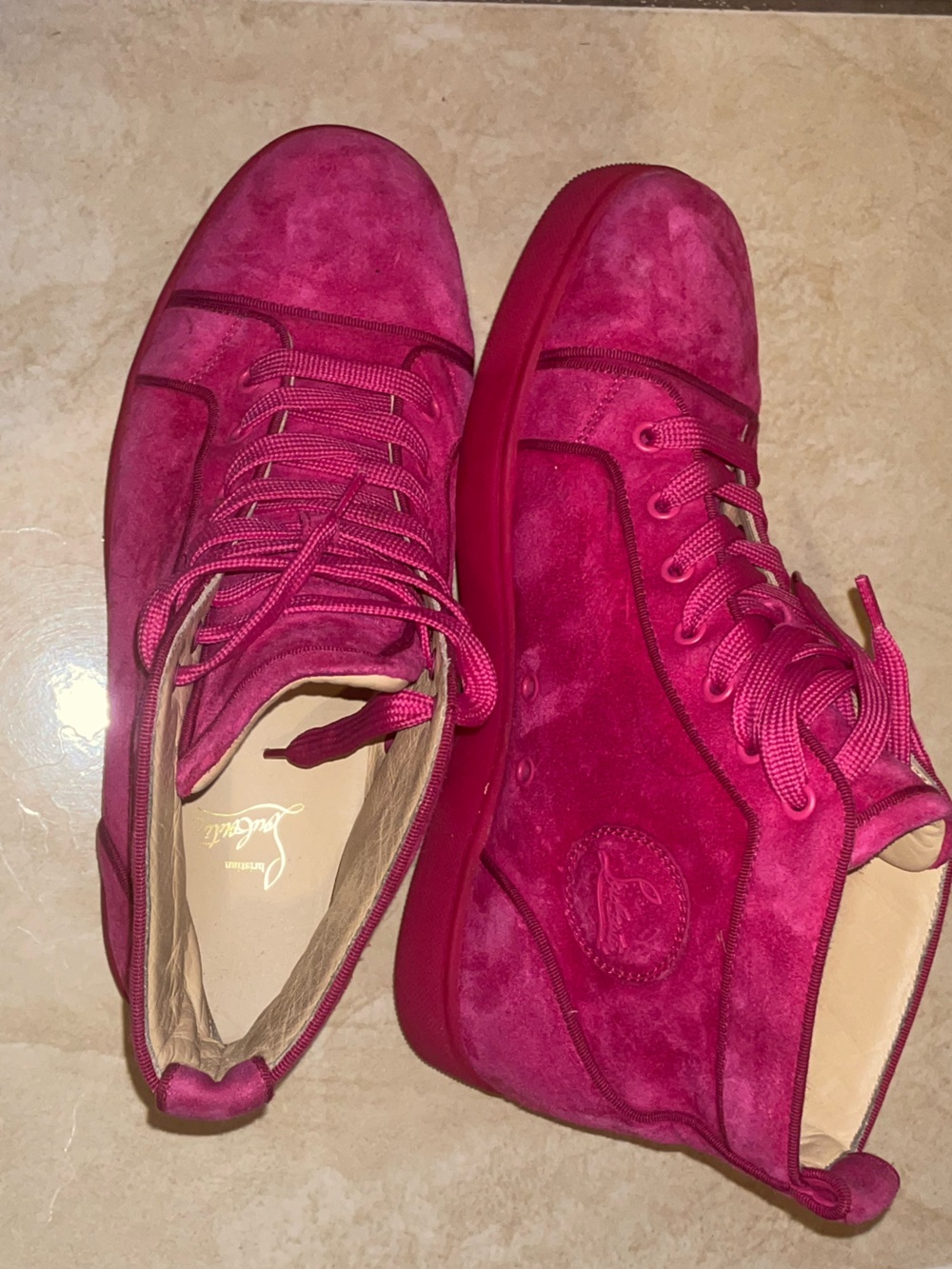 Red Suede Christian Louboutin high top sneaker